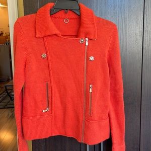One girl who orange zip up moto sweater used size medium warm and thick